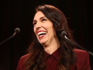 Jacinda Ardern.  Strong leadership can be attained with a smile.